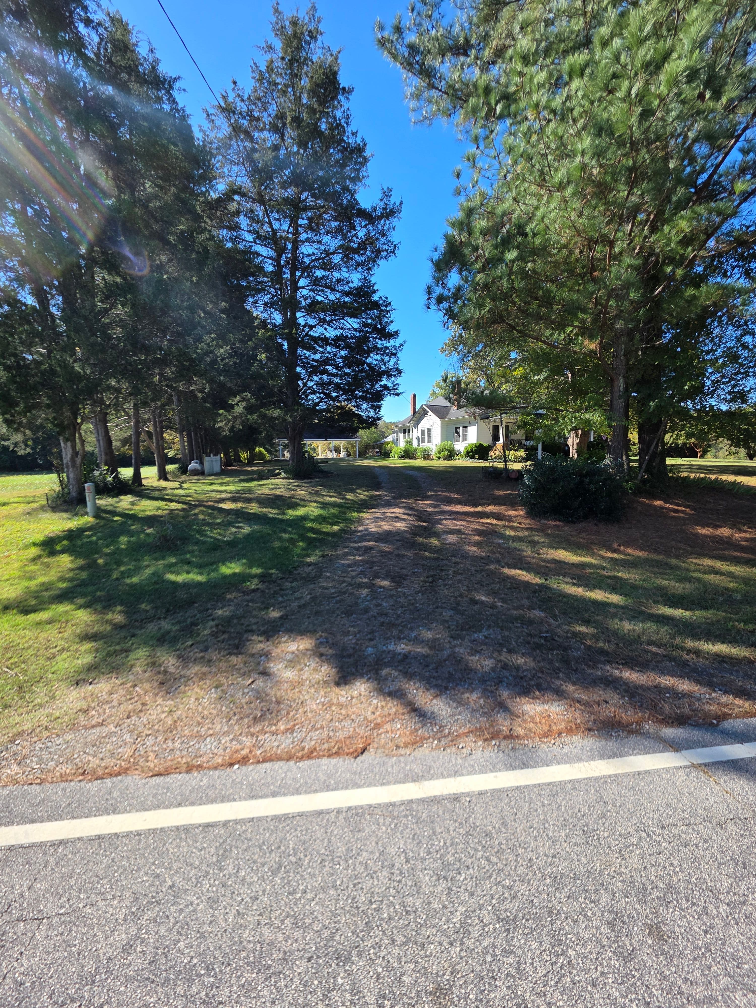 Driveway area before gravel driveway grading and fresh stone installation in Oxford N.C.