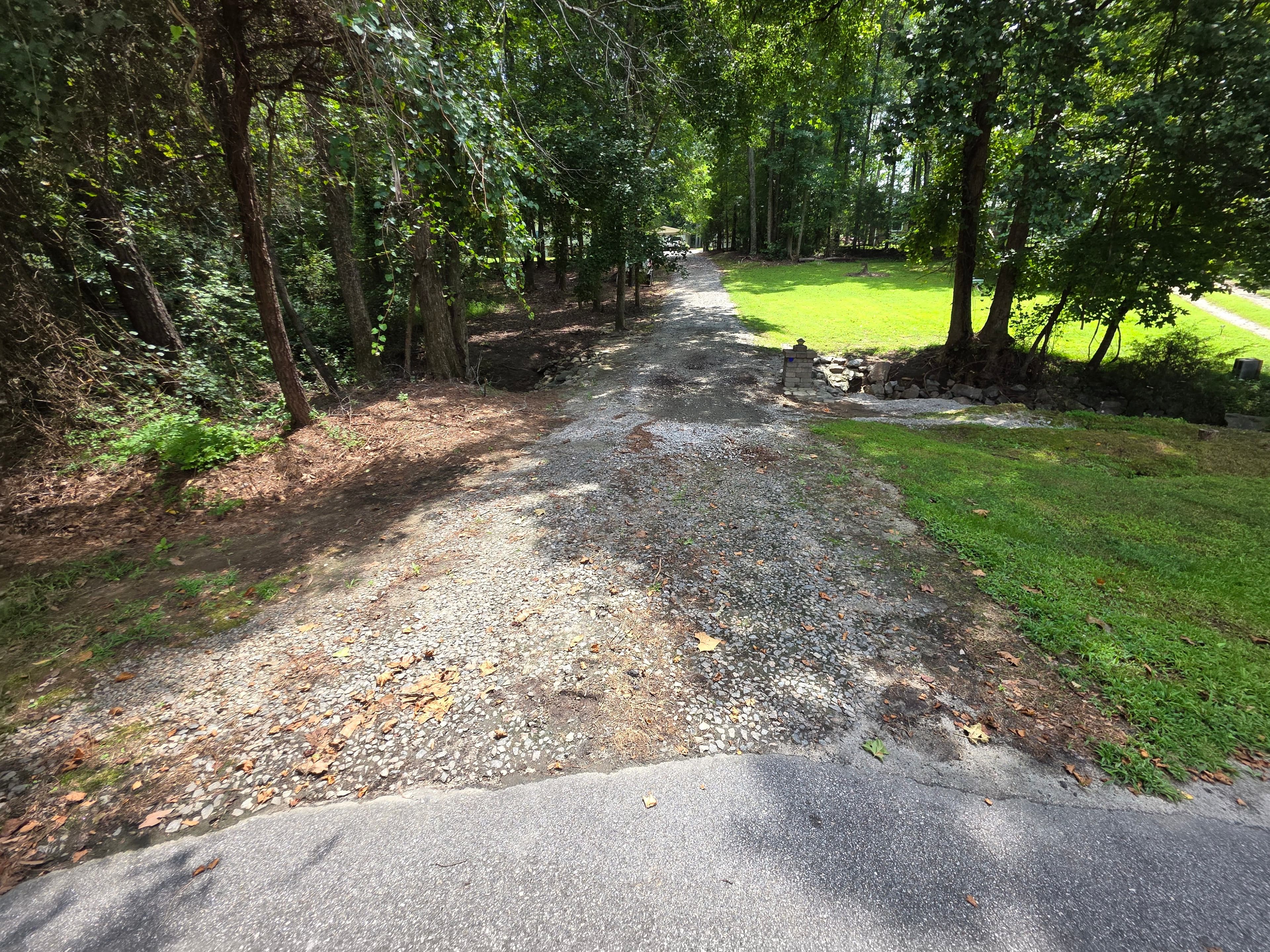 Washed out Driveway  before gravel driveway cleanup and regrading