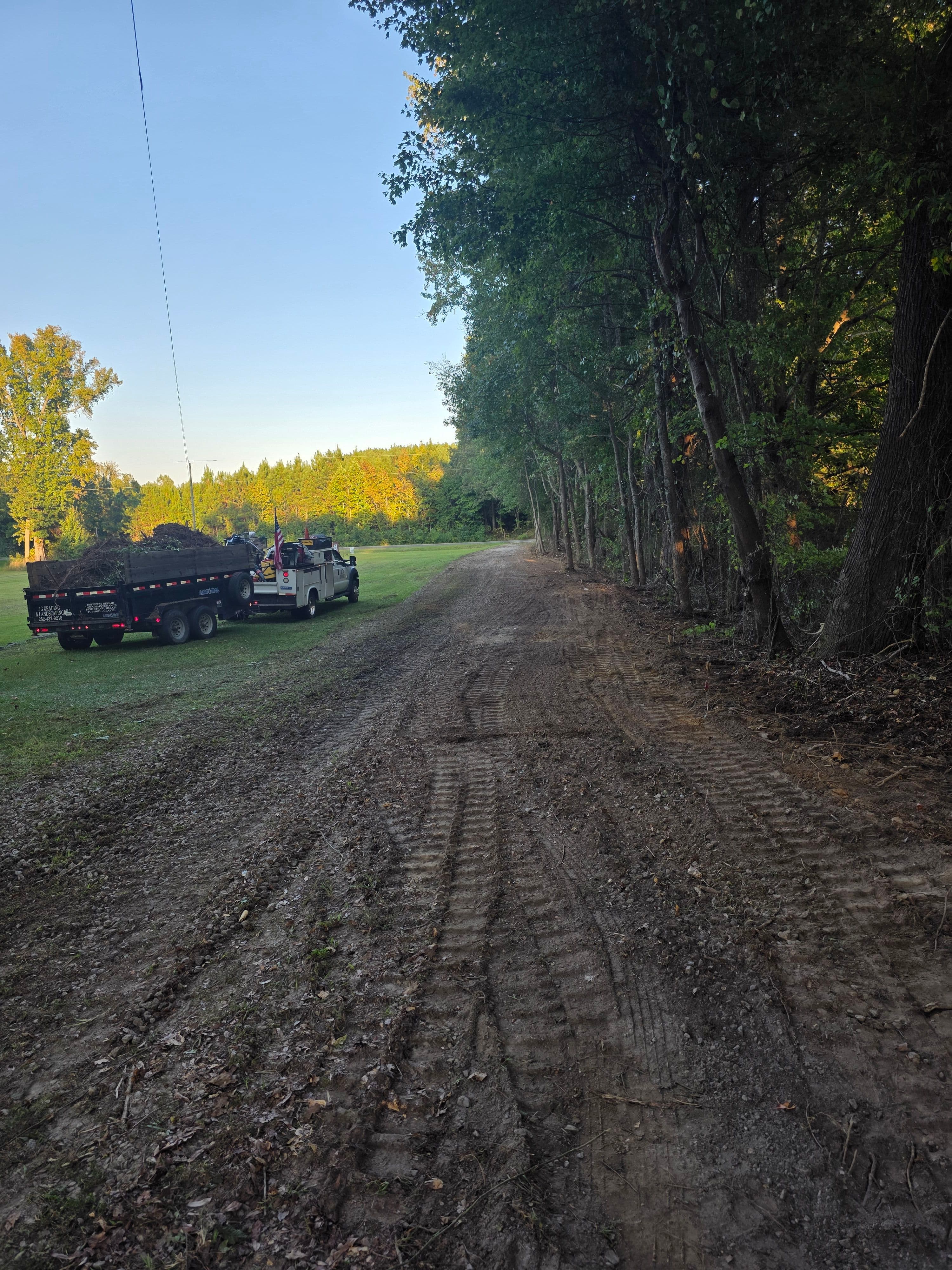 Driveway before harley raking regrading and gravel installation